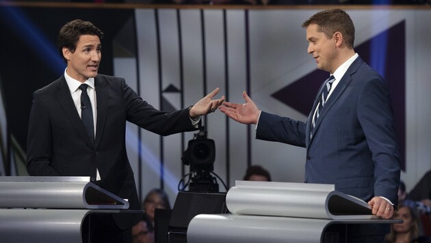 Kanadas Ministerpräsident Justin Trudeau und sein konservativer Herausforderer Andrew Scheer (Bild: AFP)