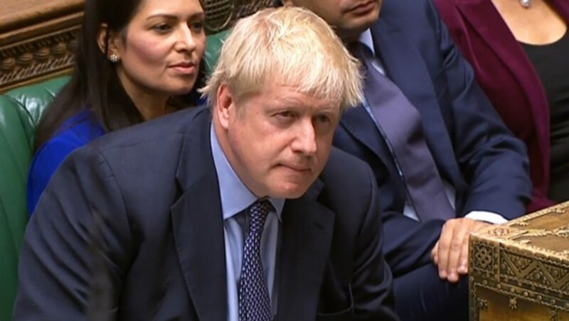 Massiv unter Druck: Boris Johnson bei der Sitzung im Parlament (Bild: APA/AFP/PRU)