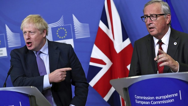 Der britische Premier Boris Johnson (li.), EU-Kommissionspräsident Jean-Claude Juncker (Bild: ASSOCIATED PRESS)