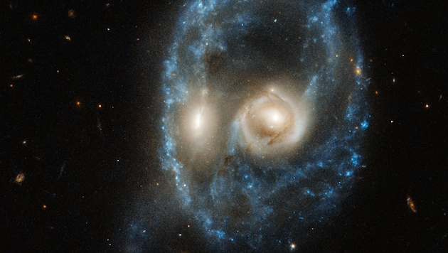 So sieht es aus, wenn zwei ungefähr gleich große Galaxien kollidieren. (Bild: AFP)