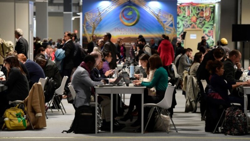 Besucher und Teilnehmer des UN-Klimagipfels in Madrid (Bild: AFP)