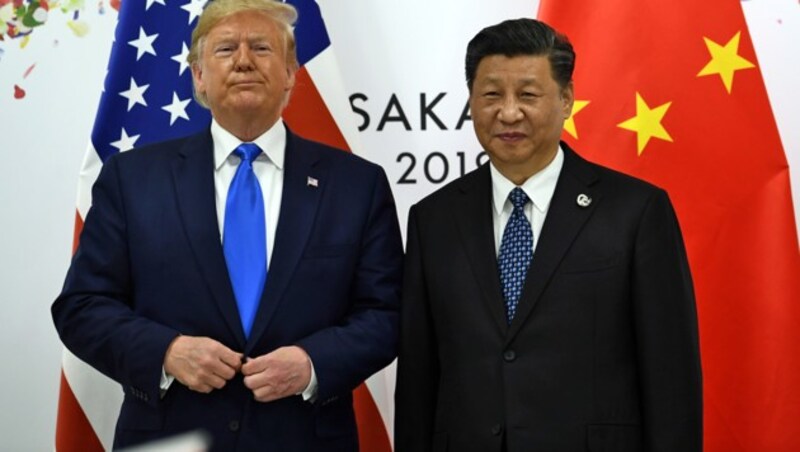 Trump und sein chinesisches Gegenüber Xi Jinping (Bild: APA/AFP/BRENDAN SMIALOWSKI)