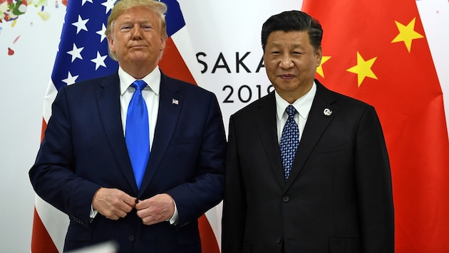 Trump und sein chinesisches Gegenüber Xi Jinping (Bild: APA/AFP/BRENDAN SMIALOWSKI)