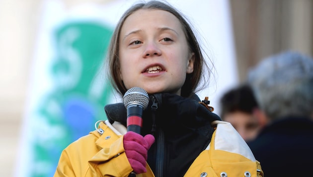 Greta Thunberg während einer „Fridays for Future“-Demo im Dezember in Turin (Bild: APA/AFP/Filippo MONTEFORTE)