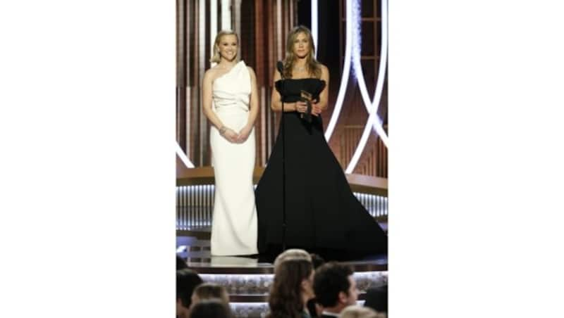 Reese Witherspoon und Jennifer Aniston auf der Bühne bei den Golden Globes in Hollywood (Bild: AP)