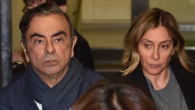 Ghosn und seine Frau Carole (Bild: AFP)