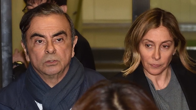 Ghosn und seine Frau Carole (Bild: AFP)