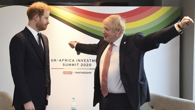 Prinz Harry und Boris Johnson (Bild: AP)