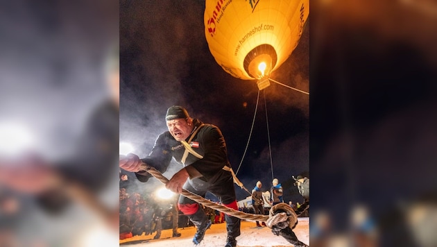 Der Weltrekord ist gelungen: Martin Hoi holt einen Heißluftballon vom Himmel. (Bild: Filzmoos Tourismus/Christian Fischbacher)