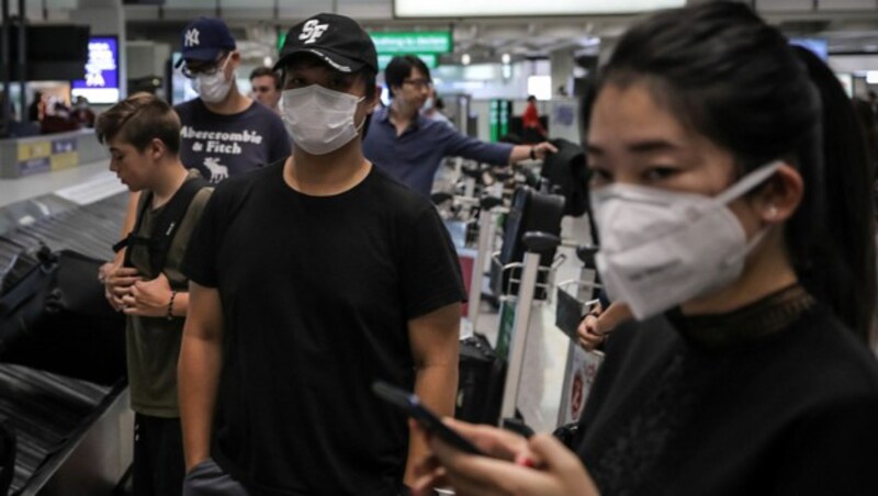 In großen Teilen Chinas gilt Schutzmaskenpflicht in der Öffentlichkeit. (Bild: AFP/Vivek Prakash)