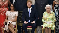 Herzogin Meghan, Prinz Harry, Queen Elizabeth II. (Bild: AP)