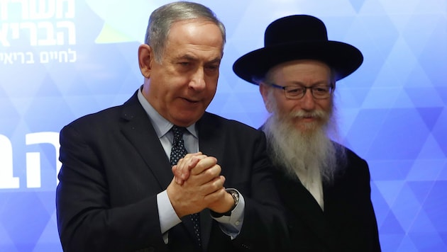 Israels Ministerpräsident Benjamin Netanyahu und Gesundheitsminister Yaakov Litzman (Bild: AFP)