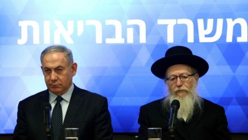 Ministerpräsident Benjamin Netanyahu und Gesundheitsminister Yaakov Litzman (Bild: AFP)