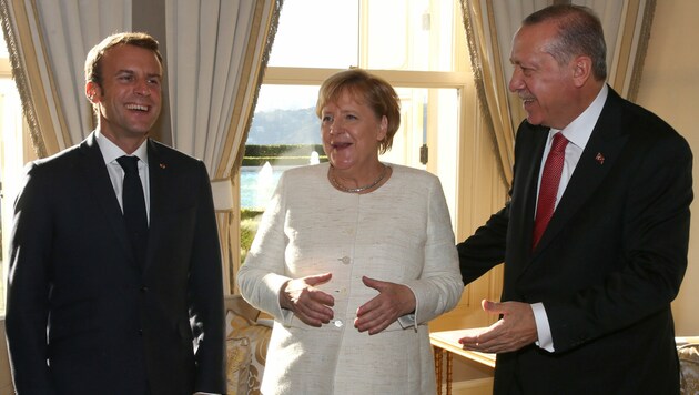 Emmanuel Macron, Angela Merkel und Recep Tayyip Erdogan (v.l.) (Bild: AFP)