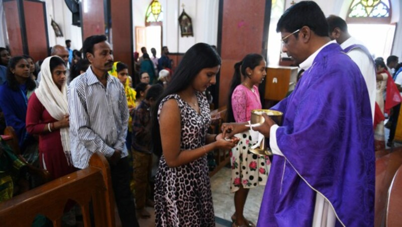 In Indien werden nach wie vor katholische Messen abgehalten. (Bild: AFP)