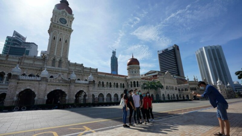 Touristen in Kuala Lumpur, Malaysia (Bild: AP)