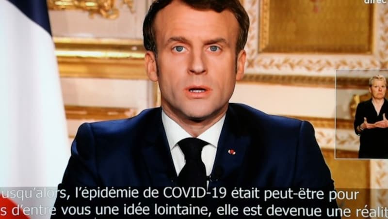 Frankreichs Präsident Emmanuel Macron in seiner TV-Ansprache (Bild: AFP)