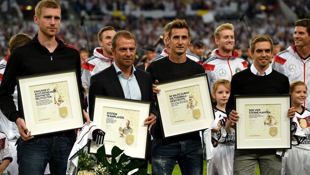 Per Mertesacker, Hansi Flick, Miroslav Klose und Philipp Lahm (von li. nach re.) (Bild: AFP)