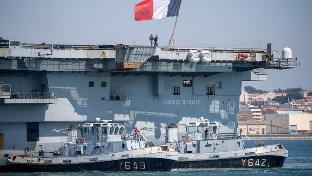 Am Sonntag erreichte die Charles de Gaulle ihren Heimathafen in Toulon mit einer noch unbekannten Zahl an Seeleuten an Bord, die mit dem neuartigen Coronavirus infiziert sind. (Bild: AFP)
