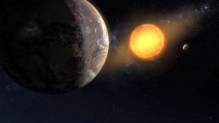 Die künstlerische Illustration zeigt zwei Exoplaneten, die um ihre Sonne kreisen.
