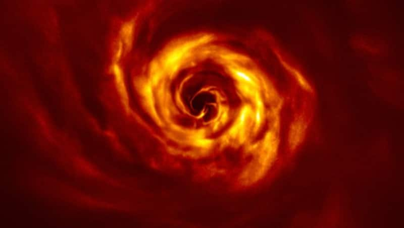 Um den jungen Stern AB Aurigae herum liegt eine dichte Scheibe aus Staub und Gas, in der Astronomen eine markante Spiralstruktur mit einem „Knick“ entdeckt haben. (Bild: ESO)