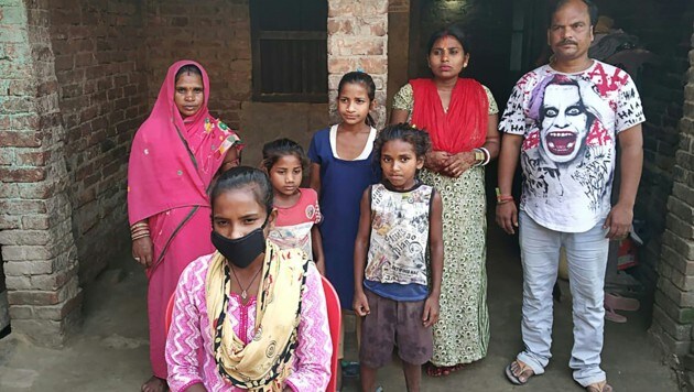 Jyoti Kumari (im Vordergrund) mit ihrer Familie. (Bild: AFP or licensors)