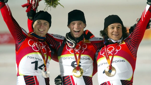 2006 wurde Reinfried Herbst beim legendären Dreifach-Sieg im Olympia-Slalom von Turin als Zweiter (li.) hinter Sieger Benni Raich mit Silber belohnt. Bronze holte Rainer Schönfelder (re.). (Bild: CHRISTOF BIRBAUMER)