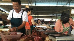 Weder die Corona-Pandemie noch eine Regierungskampagne verhinderten, dass das Hundefleisch-Festival stattfindet. (Bild: AFP )