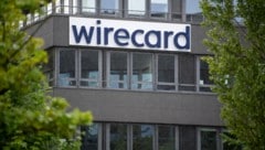 Der Schriftzug von Wirecard ist an der Firmenzentrale des Zahlungsdienstleisters zu sehen. (Bild: APA/dpa/Sven Hoppe)