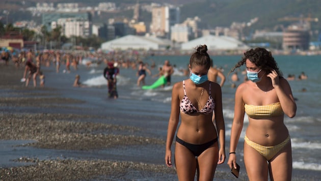 Touristen in Malaga (Bild: AFP)