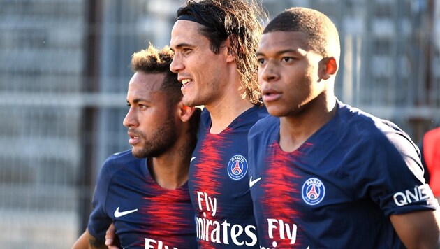 Cavani (Mitte) neben Neymar (li.) und Mbappe (re.) (Bild: AFP)
