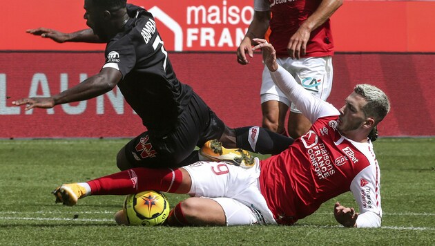 Dario Maresic (rechts unten) hatte alle Mühe ... (Bild: APA/AFP/FRANCOIS NASCIMBENI)