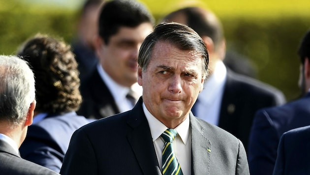 Auch in seinem Land steigen wieder die Infektionszahlen, doch für Brasiliens Präsident Jair Bolsonaro wäre ein Lockdown „verrückt“. (Bild: APA/AFP/EVARISTO SA)