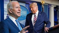 US-Präsident Joe Biden (li.) greift Anhänger seines Vorgängers Trum an. (Bild: AP, AFP, Krone KREATIV)