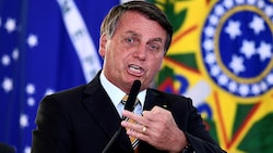 Jair Bolsonaro muss sich in der Stichwahl seinem Vorgänger Luiz Inácio Lula da Silva stellen. (Bild: APA/AFP/Evaristo Sa)