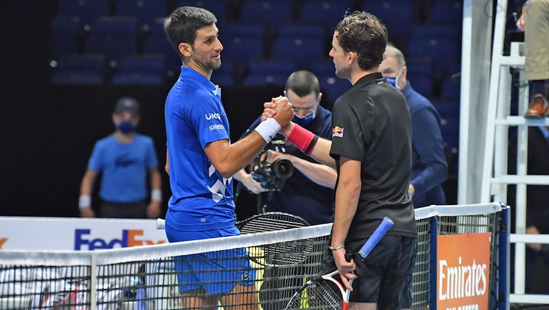 Novak Djokovic (li.), Dominic Thiem (Bild: APA/AFP/Glyn KIRK)