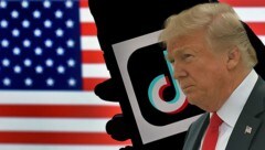 US-Präsident Donald Trump spricht sich jetzt doch gegen ein TikTok-Verbot aus. Schließlich würde das nur Facebook, dem „Volksfeind“, helfen.  (Bild: APA/AFP/Olivier DOULIERY, AFP, Krone KREATIV)