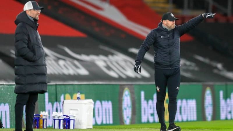 Jürgen Klopp (l.) und Ralph Hasenhüttl (r.) (Bild: AP)