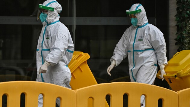 WHO-Experten machen sich in China auf die Suche nach dem Ursprung des Coronavirus. (Bild: AFP)