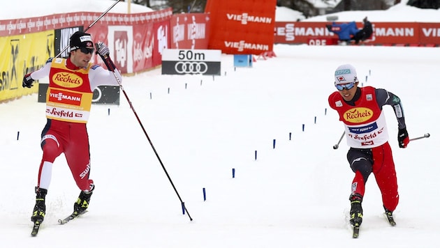 Jarl Magnus Riiber (li.) und Akito Watabe (Bild: AP)