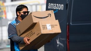 Der E-Commerce-Riese weigert sich laut Gewerkschaft, über bessere Löhne und Arbeitsbedingungen zu verhandeln. (Bild: AFP)