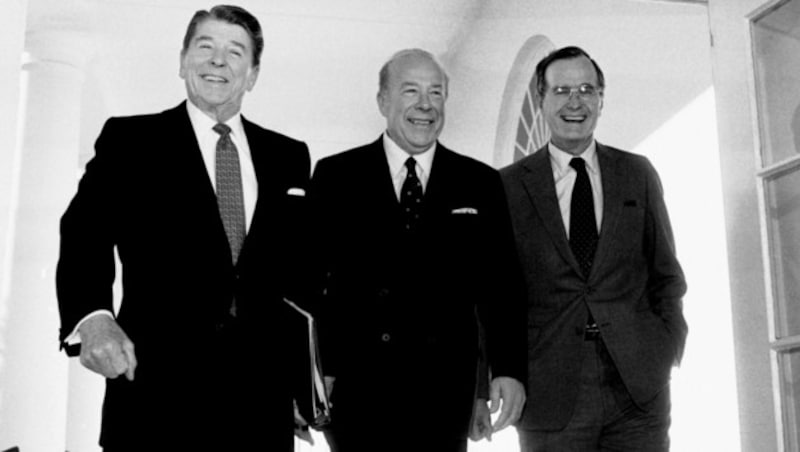 Ronalad Reagan, George Shultz und George H.W. Busch im Jahr 1985 (Bild: AP)