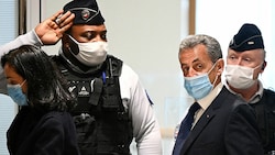 Nicolas Sarkozy vor der Verkündung des Urteils (Bild: APA/AFP/Anne-Christine POUJOULAT)