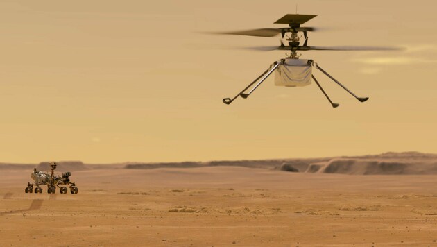 Künstlerische Illustration: So könnte der Hubschrauber „Ingenuity“ über die Oberfläche des Roten Planeten fliegen. (Bild: NASA/JPL-Caltech)