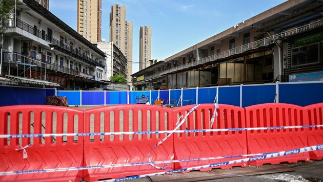 Der abgesperrte Fischmarkt von Wuhan. Hier soll die Corona-Pandemie ihren Ursprung haben. (Bild: AFP)