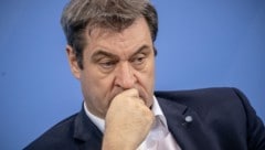 CSU-Chef und Bayerns Ministerpräsident Markus Söder zeigt sich besorgt über die politischen Entwicklungen Österreichs. (Bild: APA/dpa/Pool/Michael Kappeler)