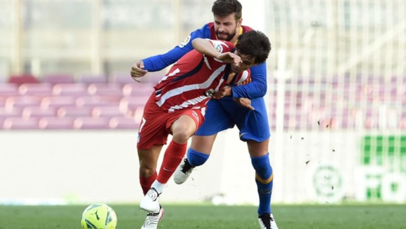 Joao Felix (li.), Gerard Pique (re.) (Bild: AFP or licensors)