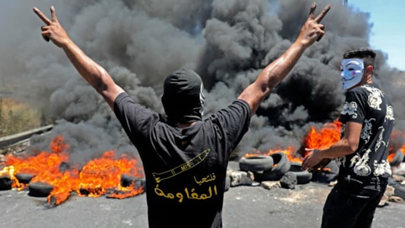 Palästinensische Demonstranten in Ramallah im besetzten Westjordanland (Bild: AFP)