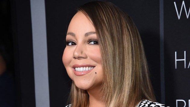 Mariah Carey denied her sister her very last wish - and did not reconcile with her. (Bild: APA/Jamie McCarthy/Getty Images/AFP)