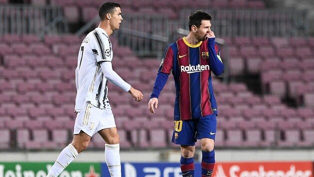 Cristiano Ronaldo (li.), hier im Spiel seines Klubs Juventus Turin gegen Barca und Lionel Messi am 8. Dezember in Barcelona. Das Hinspiel in Turin hatte Ronaldo Corona-bedingt versäumt. (Bild: APA/AFP/Josep LAGO)